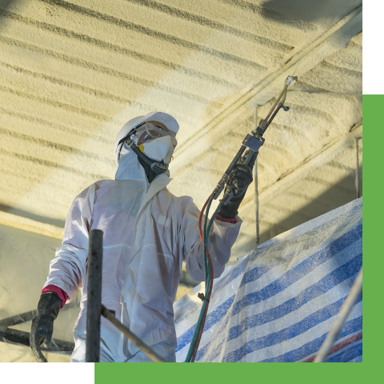 Technician Spraying Foam Insulation