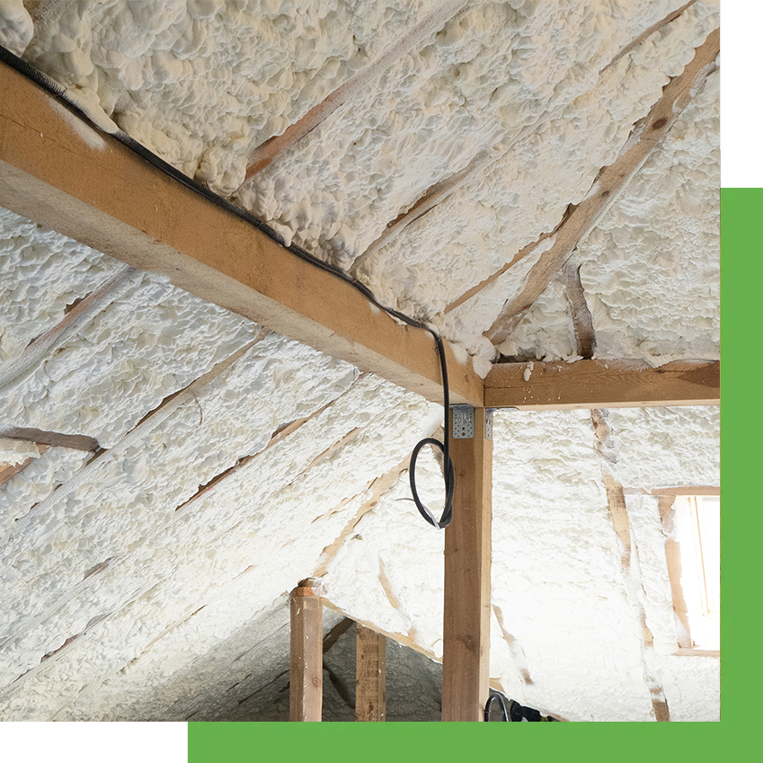 Worker Spraying Closed Cell Spray Foam Insulation Inside Home